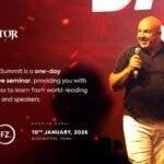 Dariush Soudi is presenting on stage at Gladiator Summit, a high-energy leadership and business seminar featuring global entrepreneurs.