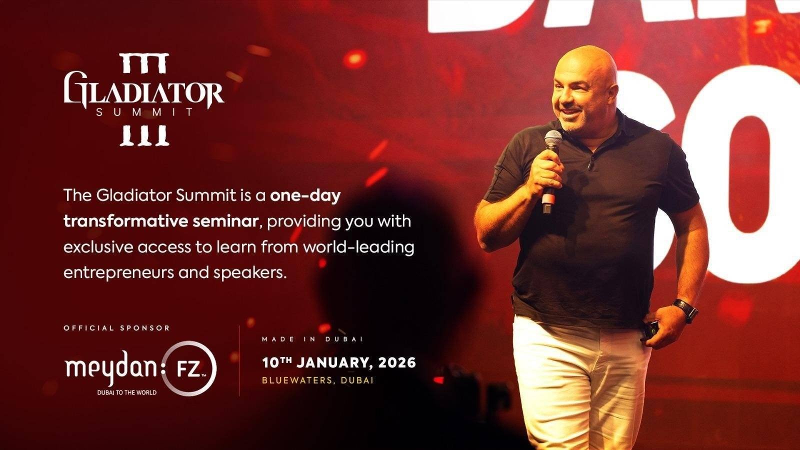 Dariush Soudi is presenting on stage at Gladiator Summit, a high-energy leadership and business seminar featuring global entrepreneurs.